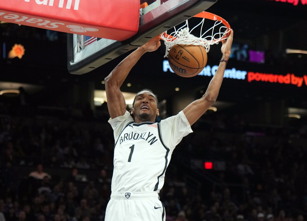 Ziaire Williams, who scored 10 points, slams home a dunk during the Nets' victory.