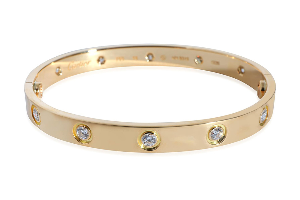 A gold Cartier bracelet with diamonds