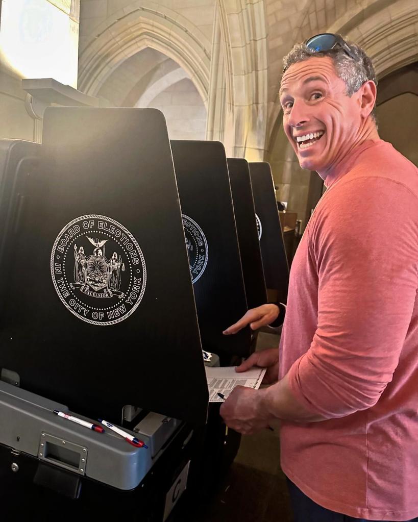 Chris Cuomo smiles while voting