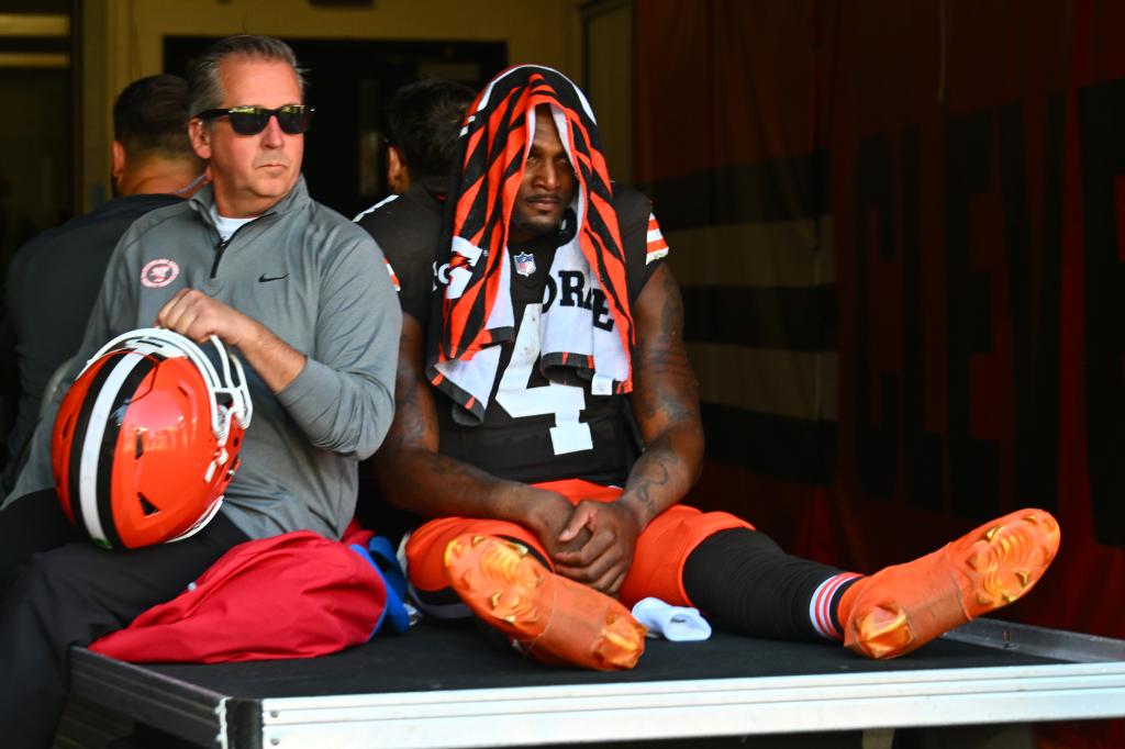 Deshaun Watson #4 of the Cleveland Browns is taken off the field on a medical cart in the second quarter of a game against the Cincinnati Bengalsat Huntington Bank Field on October 20, 2024 in Cleveland, Ohio. 