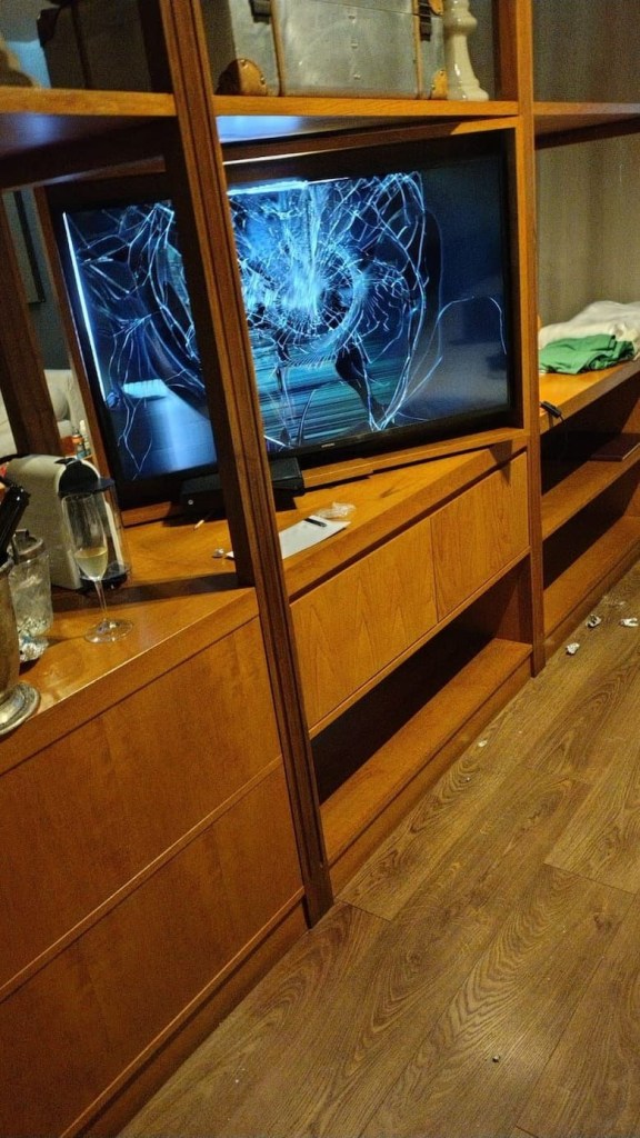 The broken TV in Payne's hotel room.