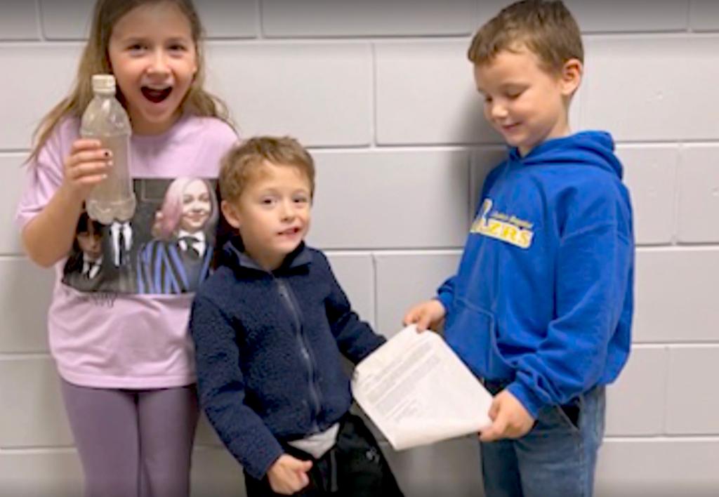 River Vandenberg (center) poses with Scarlet Van Eyk (left) and Makenzie's other son (unnamed).