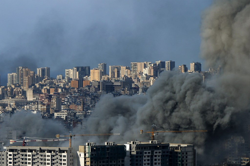 Heavy smoke billowing from an Israeli airstrike targeting a suburb in south Beirut, Lebanon amidst ongoing ceasefire talks