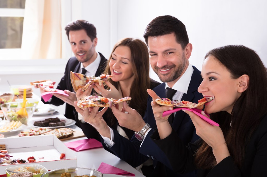 The bride said that the pizza "upstaged" the catered, vegan food.