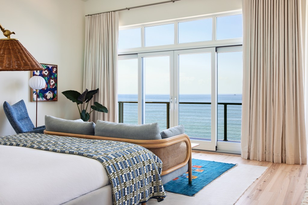 The main bedroom features water views