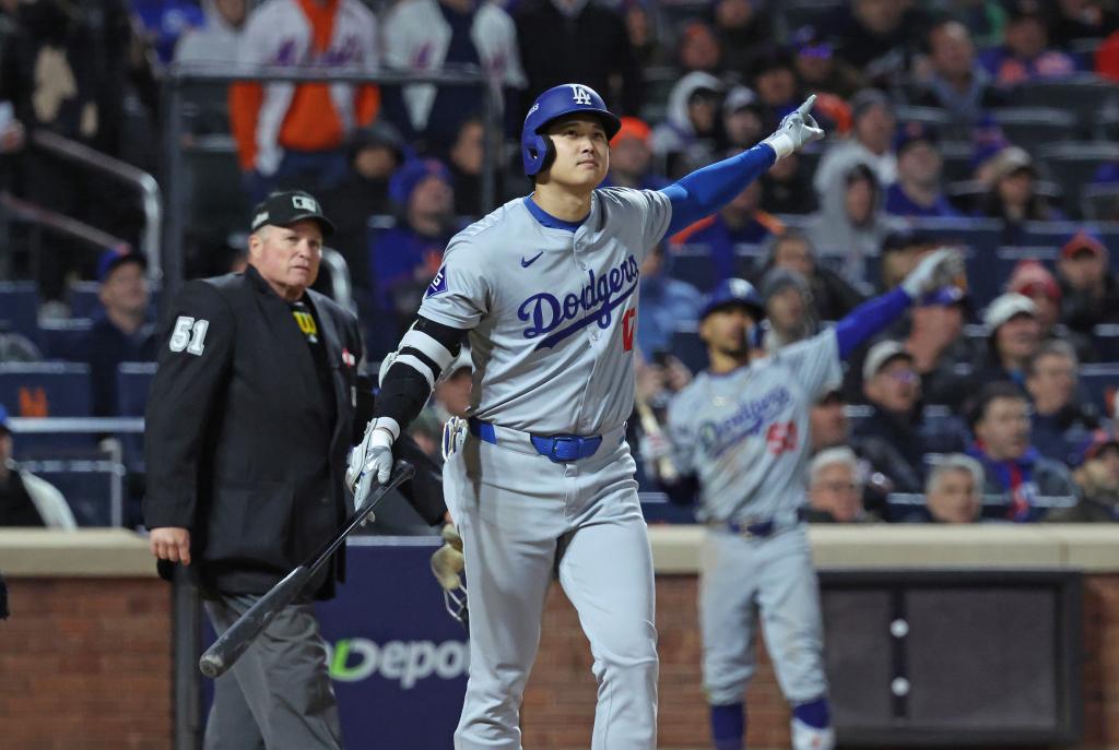 Los Angeles Dodgers designated hitter Shohei Ohtani reacting to his three-run home run during the 8th inning of NLCS, Game 3 at Citi Field