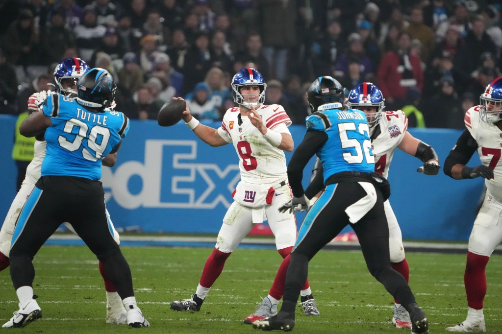 Giants quarterback Daniel Jones (8) throws a pass against the Panthers in Munich on Nov. 10, 2024.