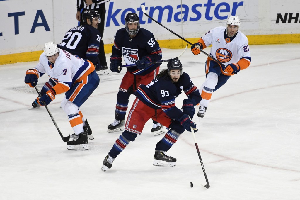  Mika Zibanejad (93) skates with the puck during the third period of an NHL hockey game against the Islanders, 