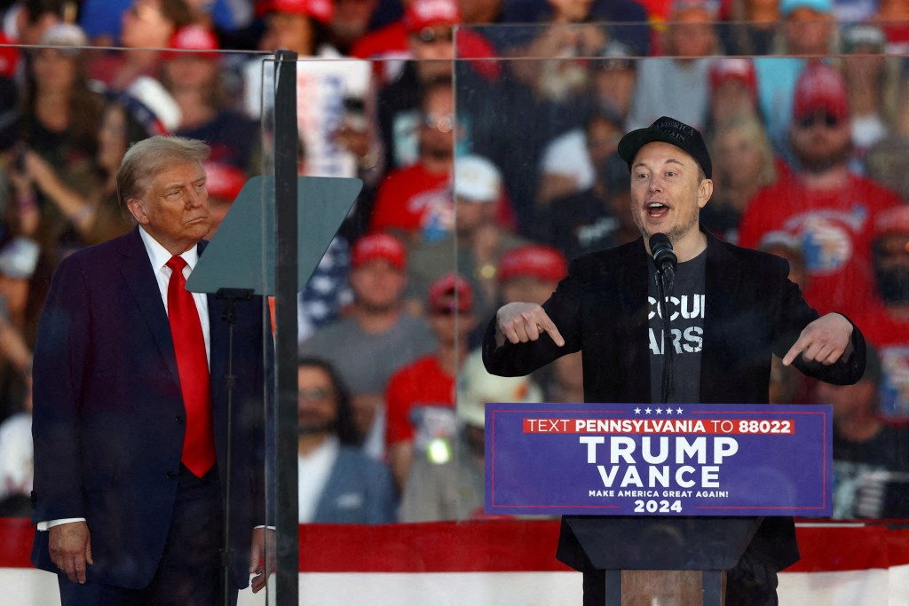 Elon Musk on stage with President-elect Donald Trump during Trump's campaign in Butler, Pa. on Oct. 5.