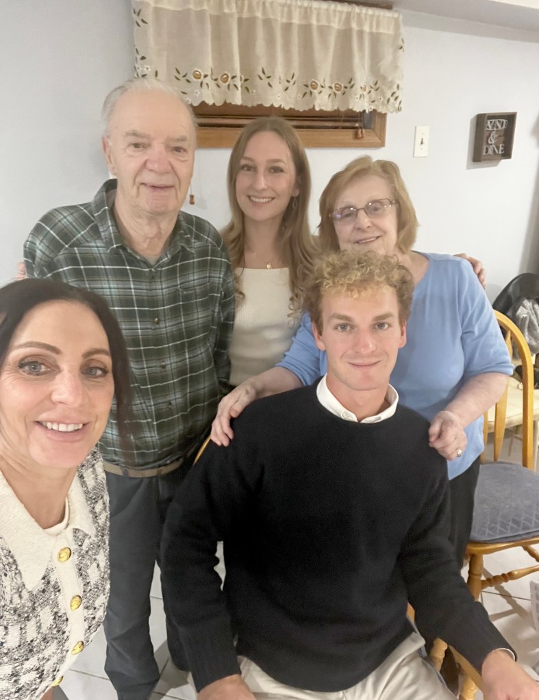 Daniel Penny with his sister Taylor, morther Gina and maternal grandparents.