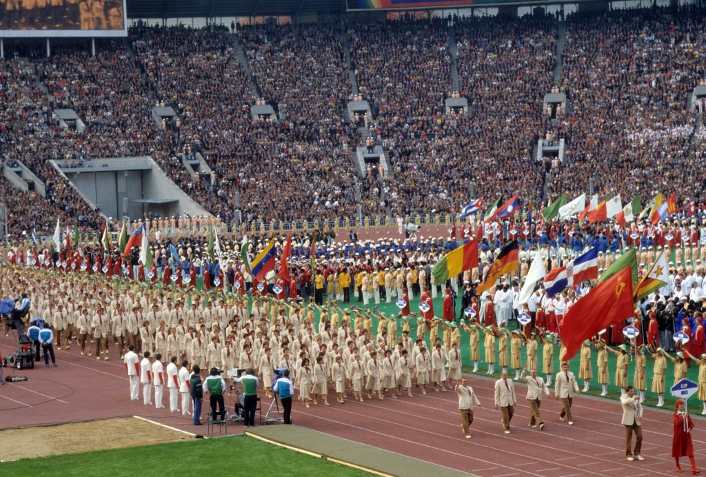 A stadium filled with people at the 1980 Moscow Olympics during the opening ceremony.