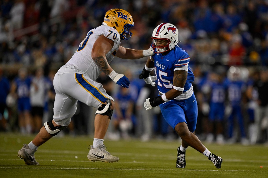 Southern Methodist Mustangs defensive end Cameron Robertson (15) rushes past Pittsburgh Panthers offensive lineman Ryan Baer (70) during the second half of a game in November.