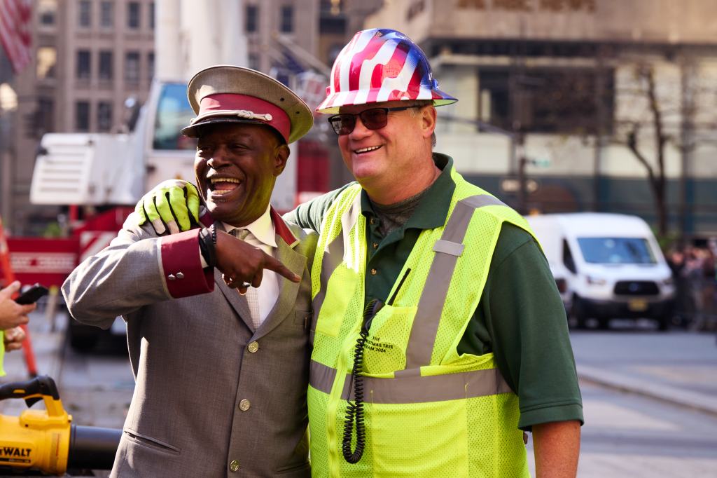 Rockefeller Center head gardener, Erik Pauze, right, with a doorman of a nearby building on Saturday, November 9, 2024. 