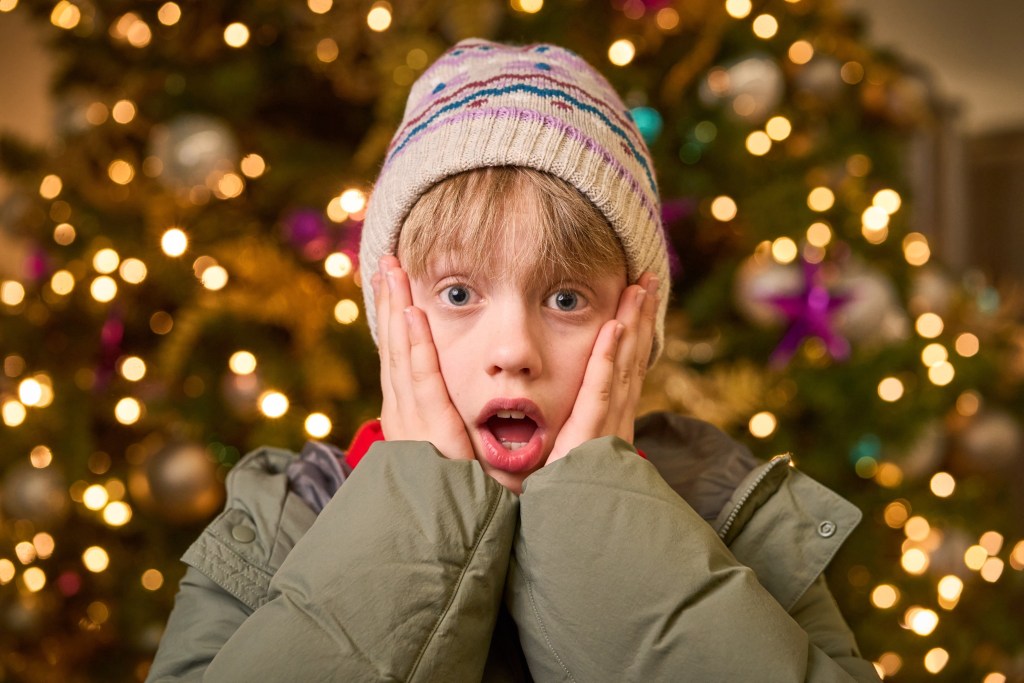 Kevin McCallister lookalike, Tyler Stringer, recreating iconic Home Alone scene for London Luton Airport's holiday travel reminder campaign