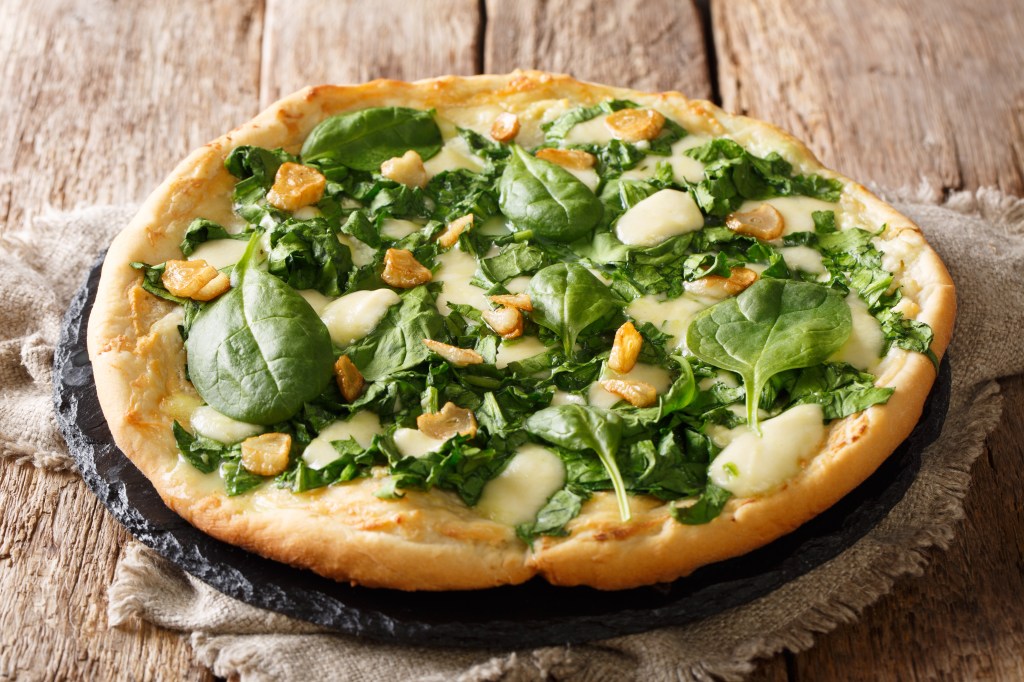 White pizza eschews tomato sauce, which can be packed with calories and salt.