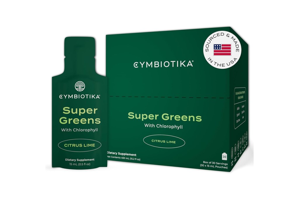 A green box with a bottle of super greens