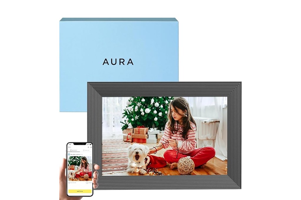 A girl and a dog in a picture frame titled 'Aura'