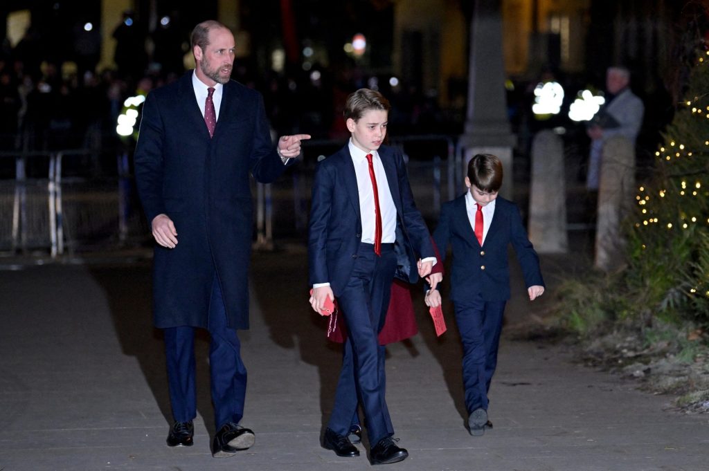 Prince William and his children, Prince George, partially visible Princess Charlotte, and Prince Louis arriving at Westminster Abbey for a Christmas carol service in London.