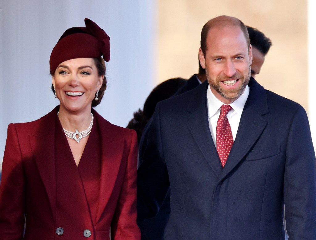 Prince William and Catherine, Princess of Wales, standing together in formal attire at the Ceremonial Welcome for the Amir of Qatar's State Visit to the UK