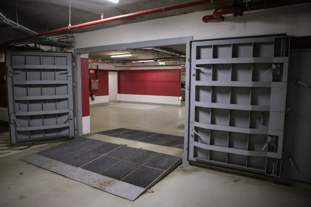 Details with the heavy metal doors of a nuclear explosion shelter (fallout shelter).