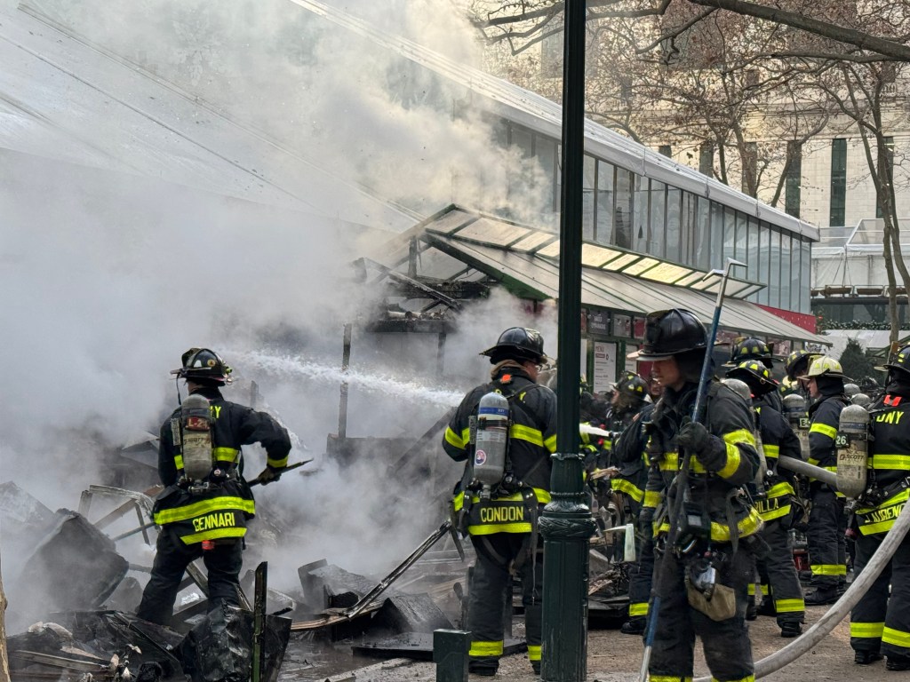 Firefighters battle the blaze that broke out on Dec. 27 around 9:20 a.m.