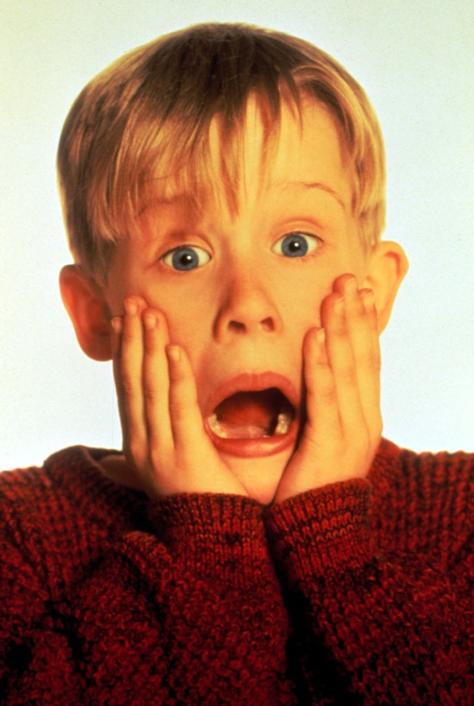 Macaulay Culkin in the 1990 film Home Alone, with a surprised expression, hands on cheeks