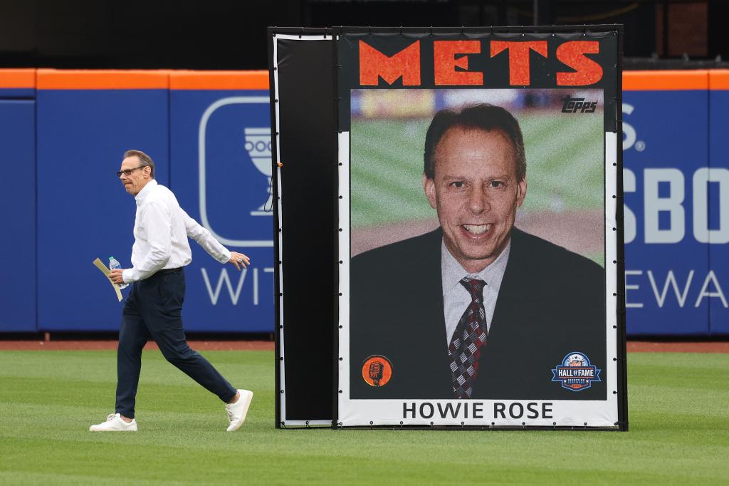 Howie Rose comes out from an enclosure behind a huge replica of his baseball card at the Mets Hall of Fame Ceremony before the game when the New York Mets played the Toronto Blue Jays Saturday, June 3, 2023 at Citi Field in Queens, NY. 