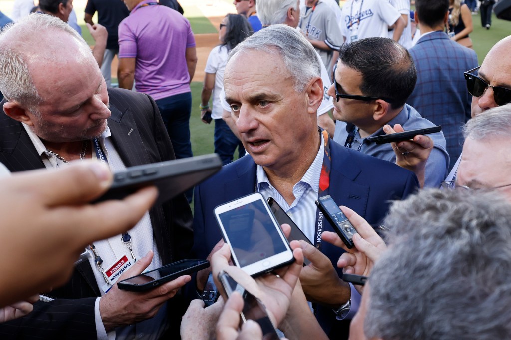 Rob Manfred, Commissioner of Major League Baseball, talks to the media before the New York Yankees play the Los Angeles Dodgers during Game Two of the 2024 World Series at Dodger Stadium on October 26, 2024 in Los Angeles, California.