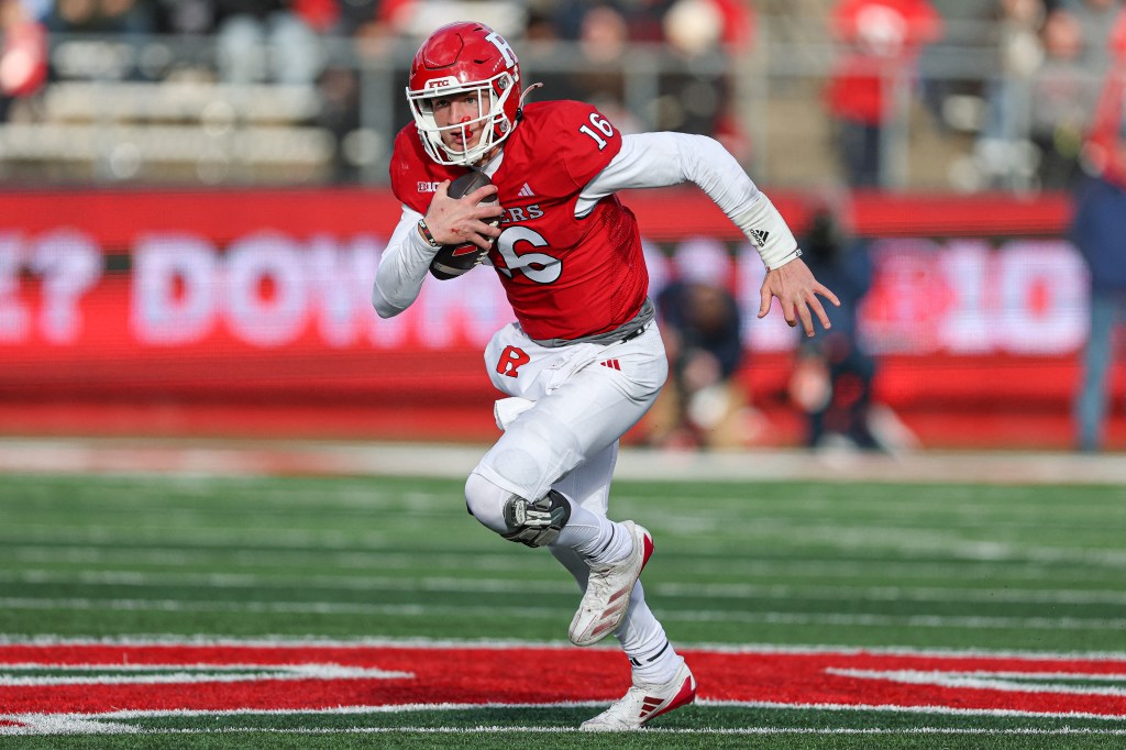 Scarlet Knights quarterback Athan Kaliakmanis (16) carries the ball 