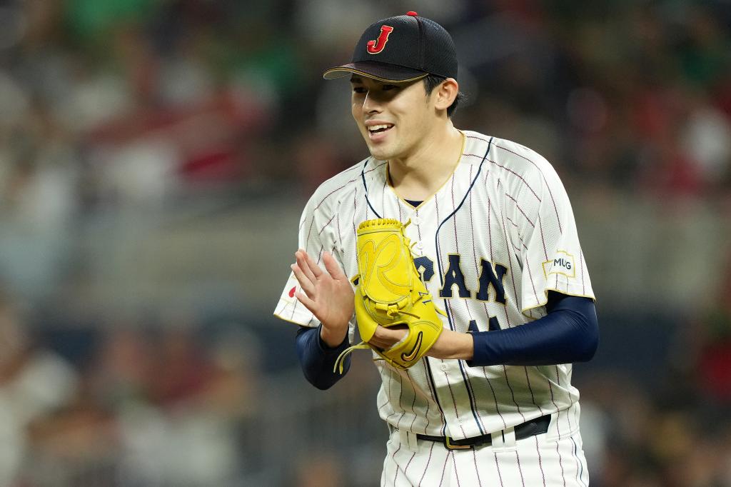 Roki Sasaki, player #14 of Team Japan, reacting after an out in the third inning against Team Mexico in the World Baseball Classic Semifinals