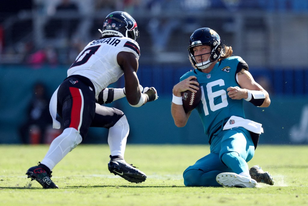 Trevor Lawrence had already started to slide before being hit.