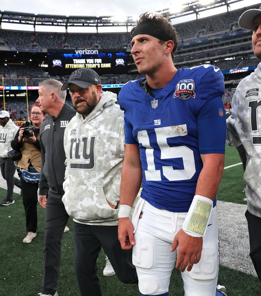 Then-starting quarterback Tommy DeVito (15) was injured in the loss to Tampa Bay.