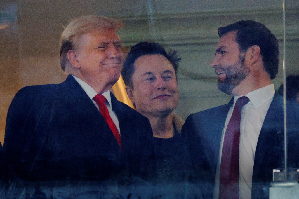 U.S. President-elect Donald Trump, Tesla and SpaceX CEO Elon Musk, and Vice President-elect J.D. Vance attending the Army-Navy football game in Landover, Maryland, December 14, 2024.