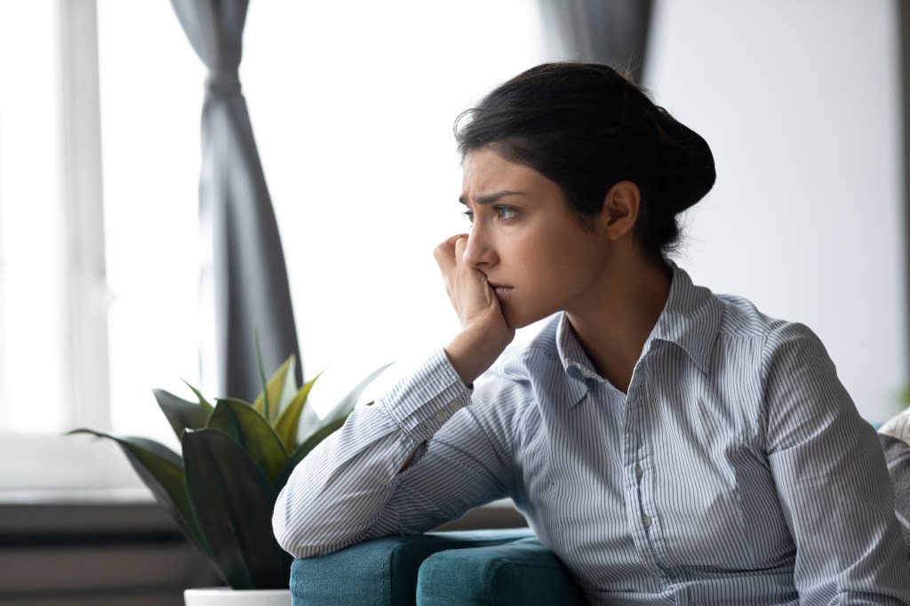 Sad-looking woman, staring off into the distance