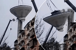 Water tower crashes to ground after crane snaps, killing one in China