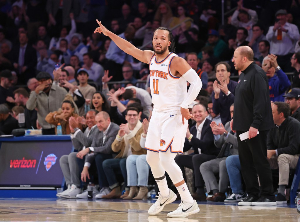 New York Knicks guard Jalen Brunson #11 reacts after hitting a three-point shot during the second quarter.