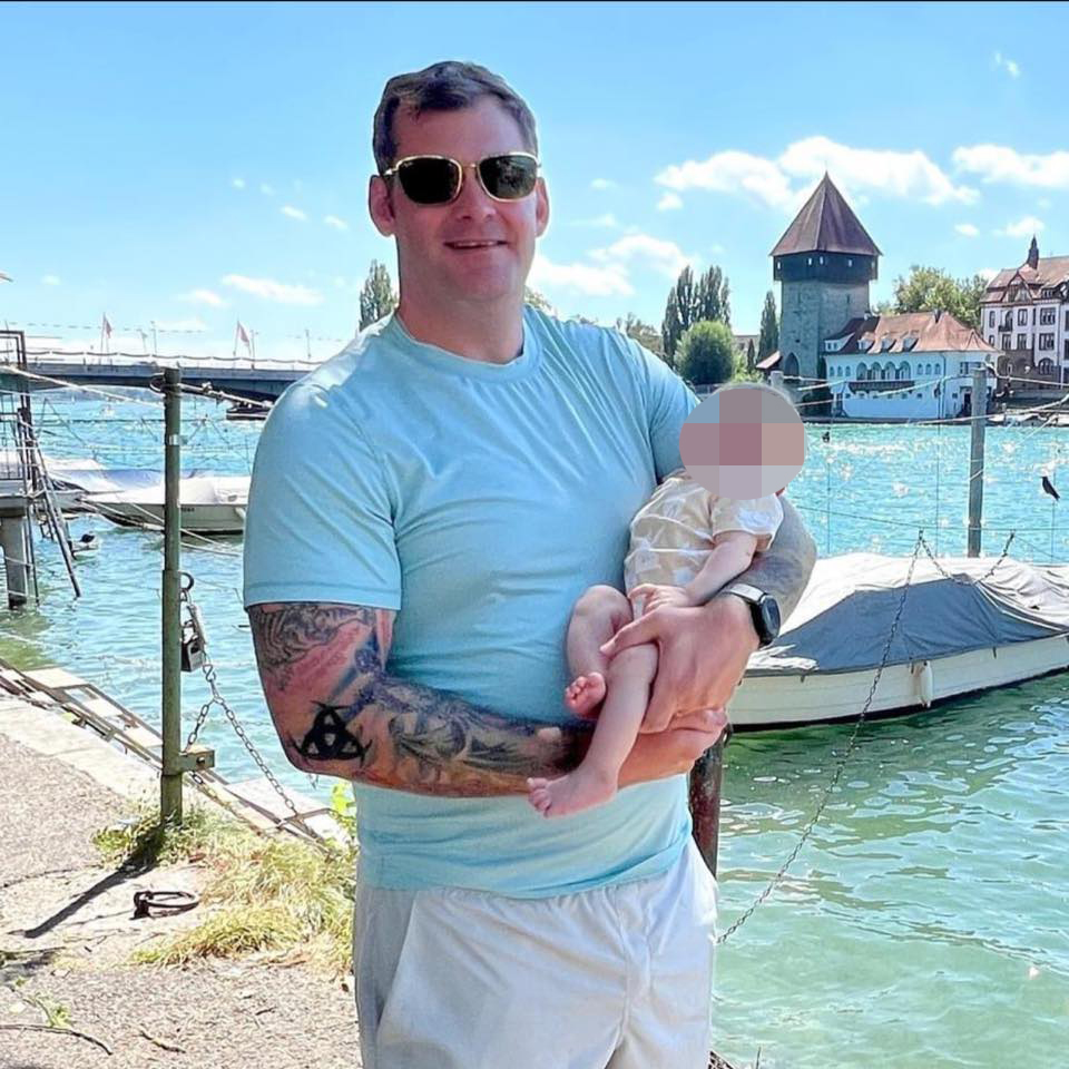 Matthew Livelsberger, also known as Matt Berg, in a Facebook photo holding a baby, before the Tesla Cybertruck incident at Trump International Hotel, Las Vegas