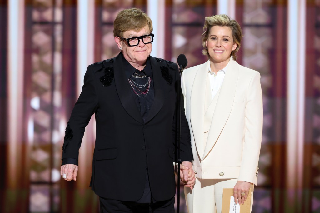 Elton John and Brandi Carlile during the 2025 Golden Globes. 