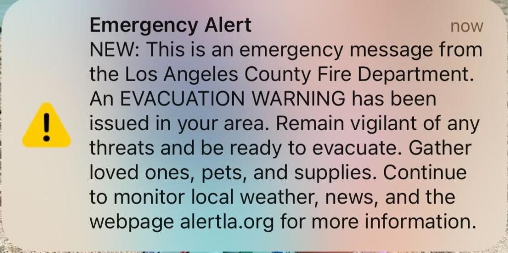 An evacuation order issued across Los Angeles County sent residents battling the historic wildfires into panic — until they realized minutes later the alert was sent by mistake. 