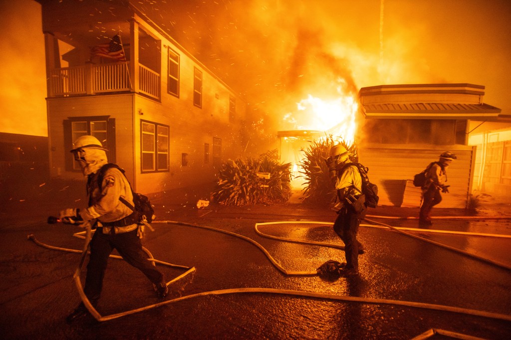 Firefighters battle the Palisades Fire