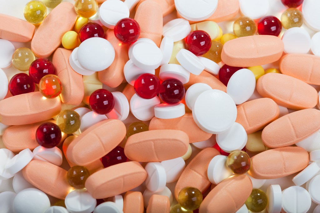 Consult with a doctor before taking supplements, especially ones in high doses. Here, an assortment of pills is shown.