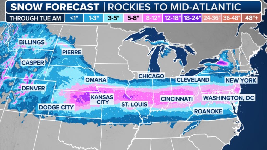 Snow forecast map of the United States showing a storm system moving through the northern Rockies and central Plains