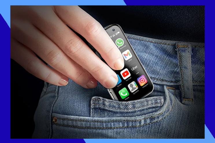 A hand holding a phone in a pocket