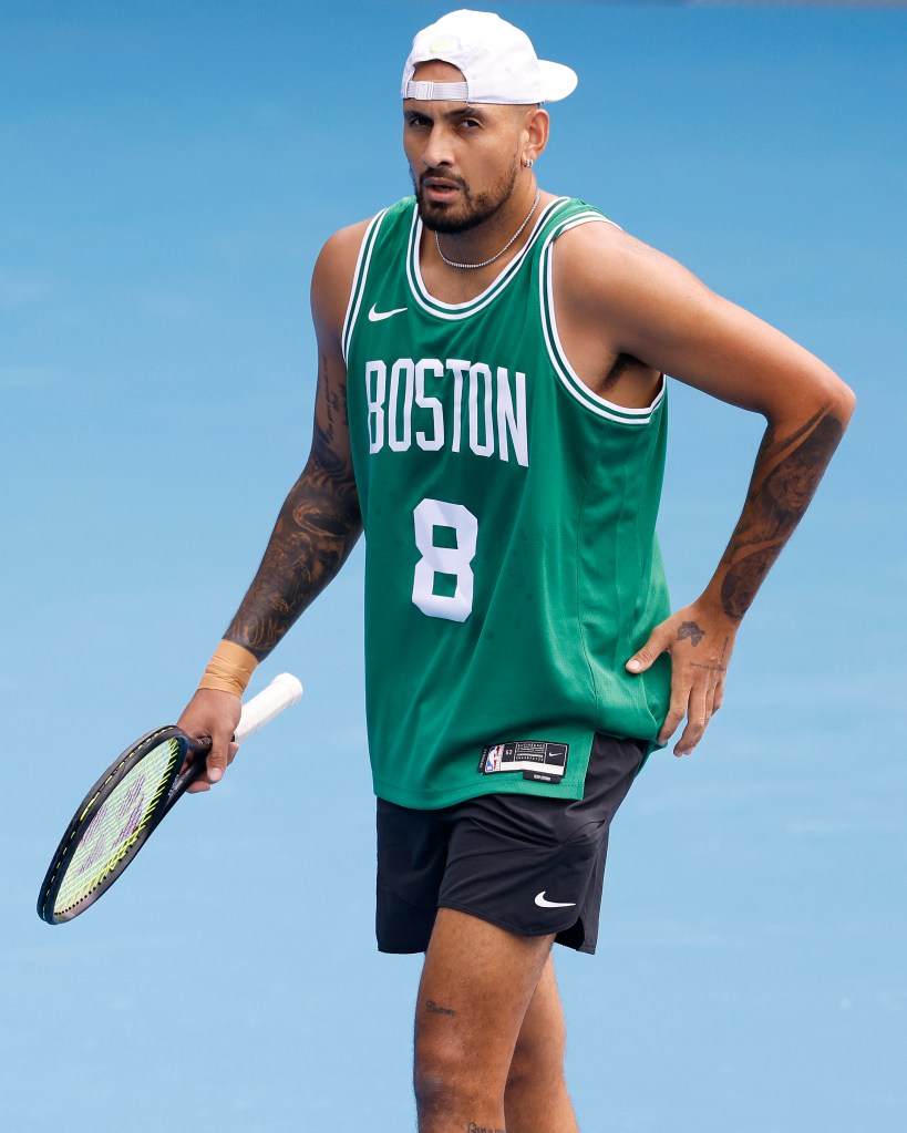 Nick Kyrgios of Australia holding a tennis racket during a practice session for the 2025 Australian Open