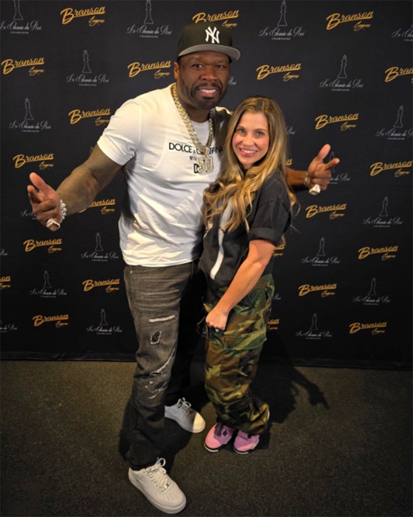 50 Cent and Danielle Fisher recently made headlines. Here, 50 Cent and Danielle Fisher posing for the cameras.