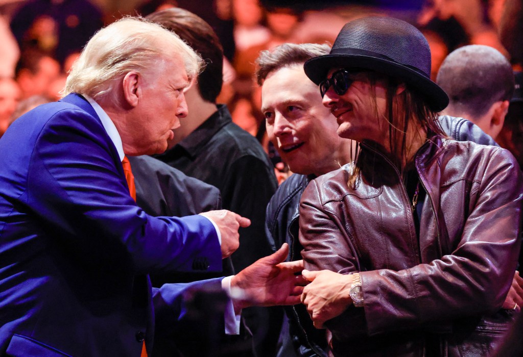 US President-elect Donald Trump (L) talks with Tesla and SpaceX CEO Elon Musk (C) and singer Kid Rock as they attend UFC 309 at Madison Square Garden in New York, on November 16, 2024. (Photo by Kena Betancur / AFP) (Photo by KENA BETANCUR/AFP via Getty Images)