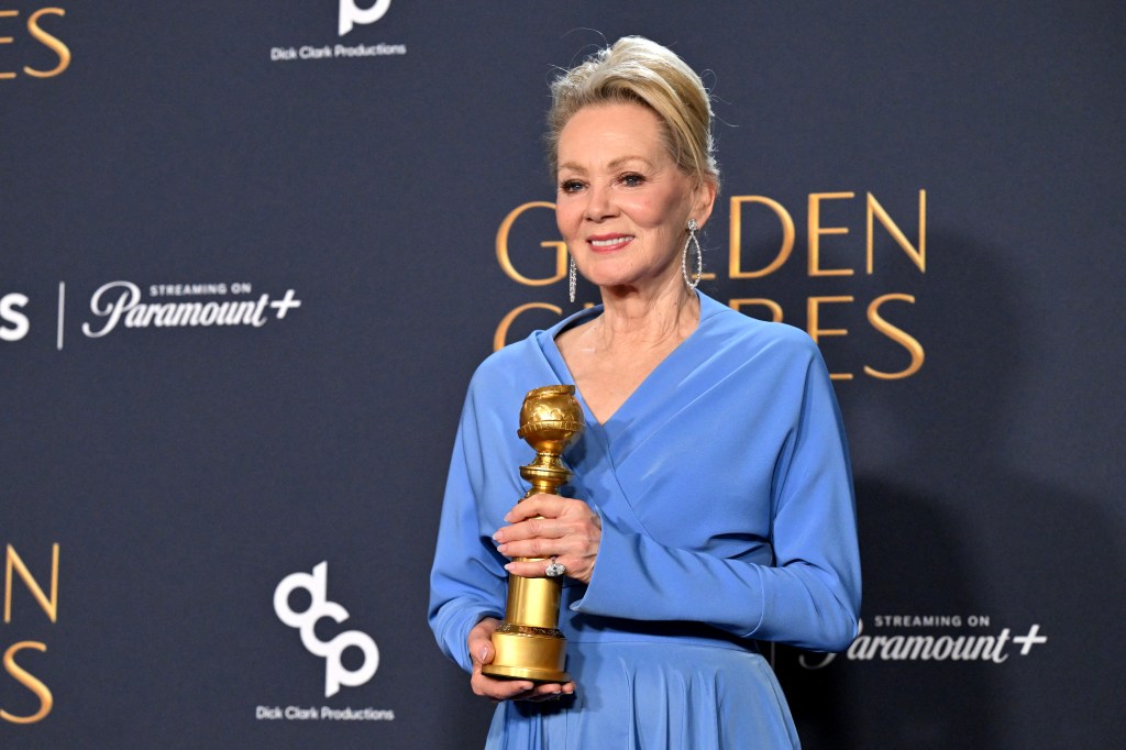 Jean Smart holding a golden globe