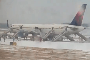 Delta passengers evacuated by emergency slides in Atlanta during winter storm