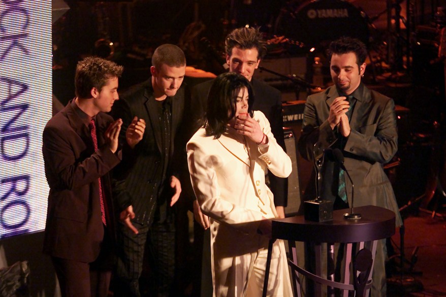 Michael Jackson accepts his award for being inducted into the Rock and Roll Hall of Fame from 'NSYNC at the 16th Annual Rock and Roll Hall of fame Induction Dinner at the Waldorf Astoria in New York City, Monday, March 19, 2001. Photo by Frank Micelotta/ImageDirect.