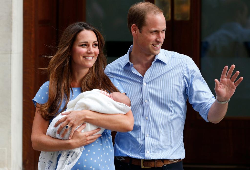 Kate Middleton and Prince William with their first child, son Prince George.